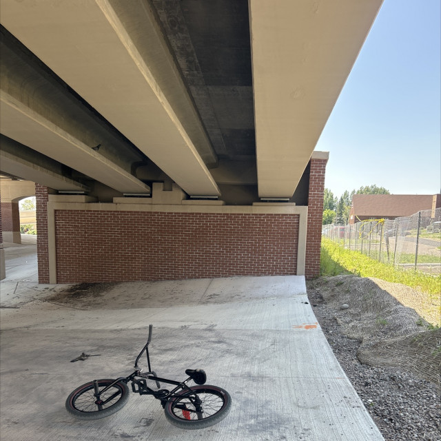 bank to wall under bridge