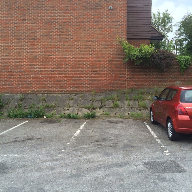 Wall drop into bank / bank to wall ride