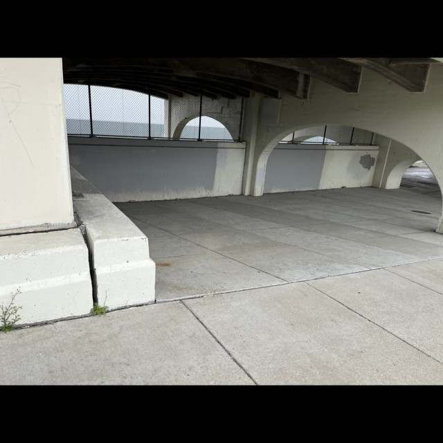 Ledge to bank under bridge