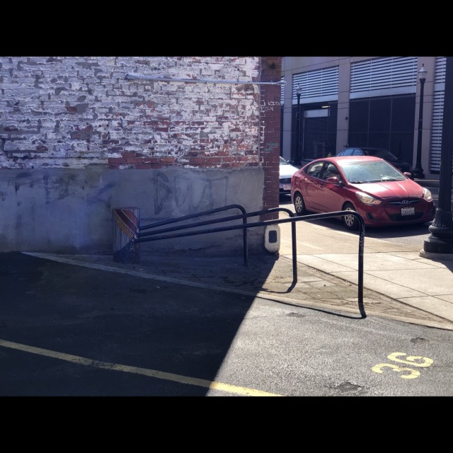 Weird bike rack/rails and slanted grates wallride