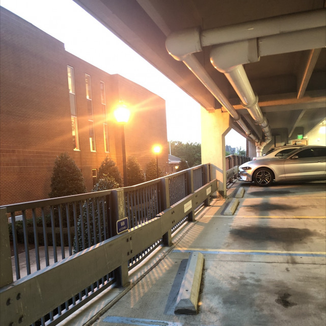 Parking garage square rail