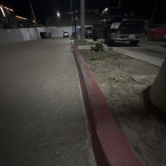 Butter sloppy curb in parking lot