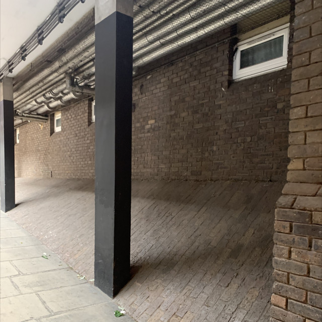 Midway house bank wall 
