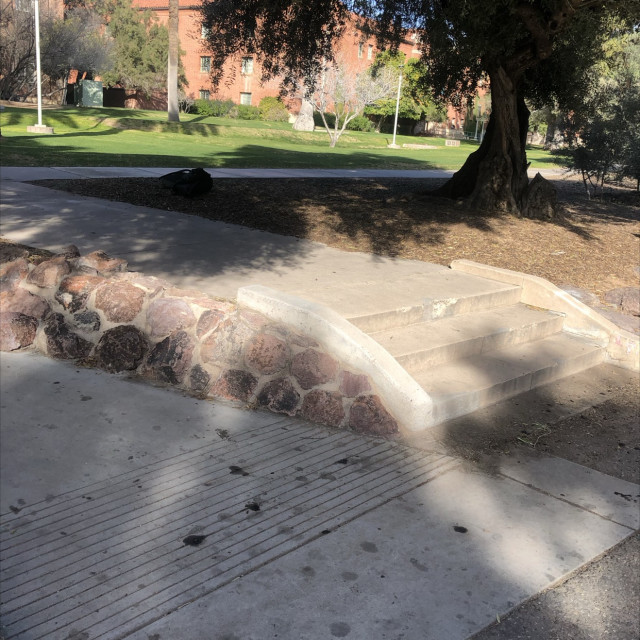 Gap over rocks with 3 stair