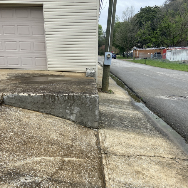 Behind Funeral home 