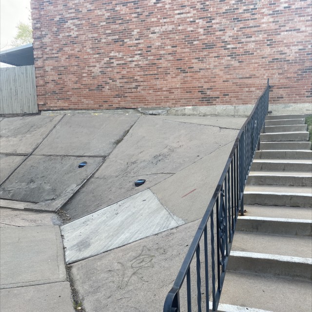 Wall ride over handrail 
